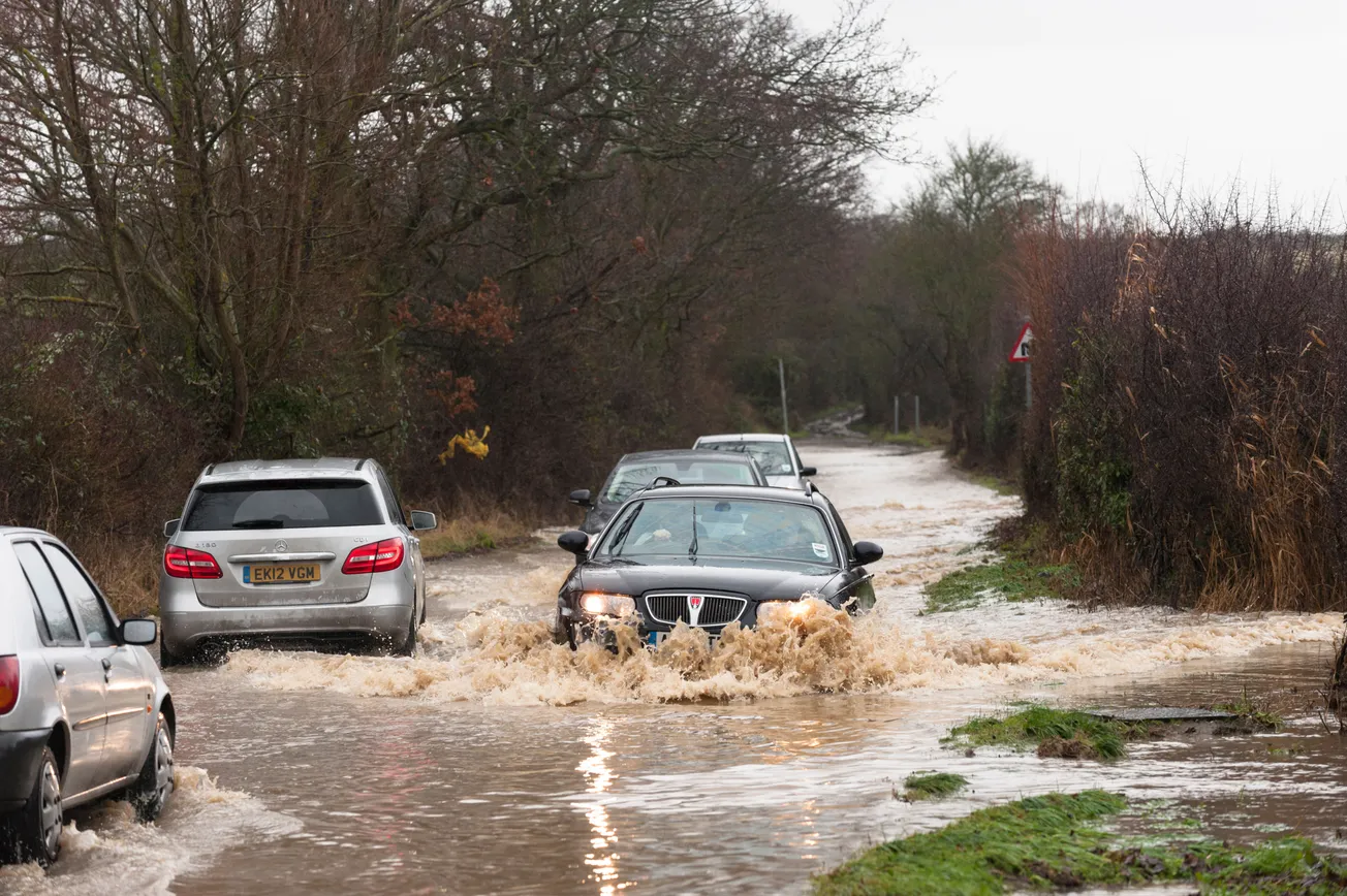 Plymouth flood chaos: Manholes explode and road closures as heavy rain triggers travel disruption